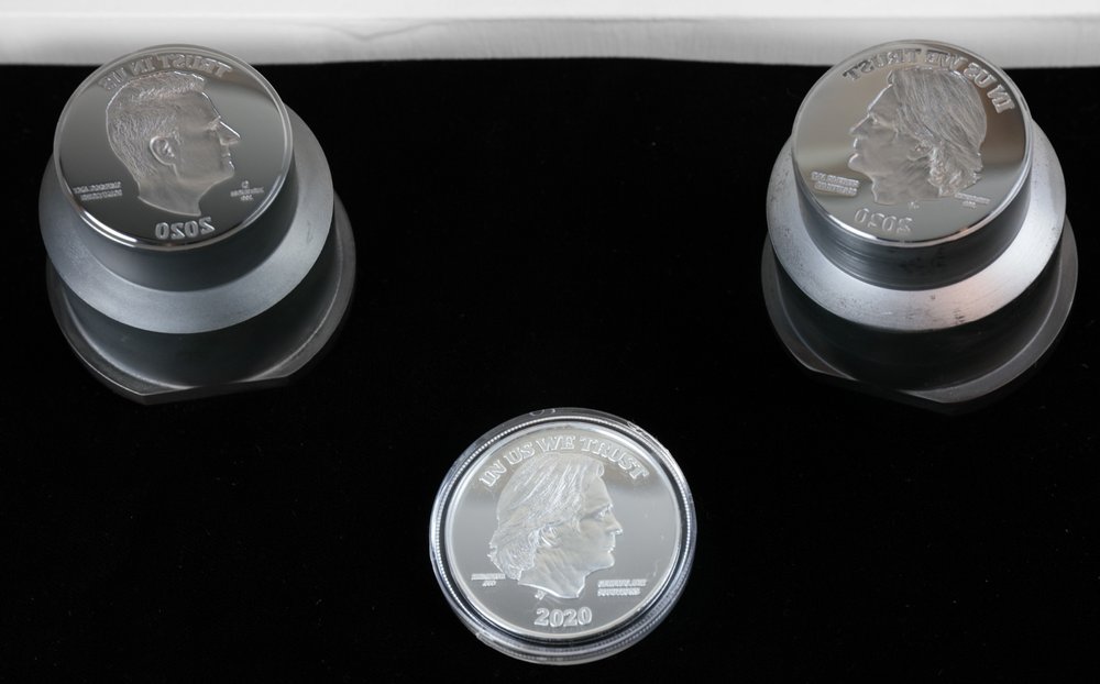 "...Heads you Lose" coins