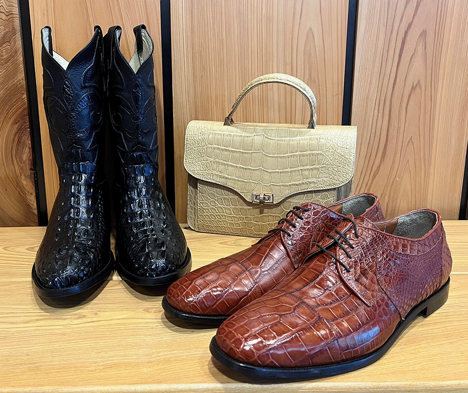 Louisiana alligator-skin mens’ boots, mens’ shoes, and ladies’ purse, ca. 2020. Items acquired from Acadian Leather, owned and operated by Marco Dermody in Clinton, Louisiana.