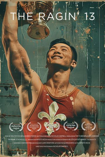 Poster for the documentary The Ragin’ 13. The image shows a victorious weightlifter in a red singlet featuring a large white fleur-de-lis, holding a trophy high overhead. His face is lit with pride and determination. The background is textured in warm tones, with laurels along the bottom noting multiple film festival awards. Text at the top reads “The Ragin’ 13.”